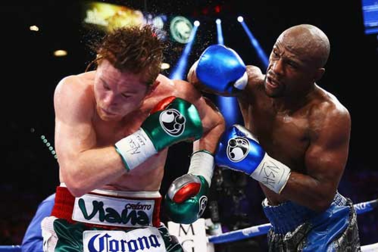 Mayweather's fight with Saul Alvarez grossed $150 million. Like most of his fights, it wasn't close. Photo: Getty