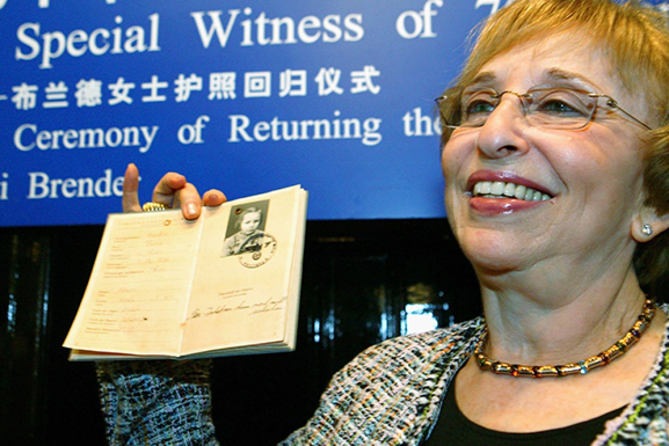 Gerti Brender with the passport she used to gain entry to Shanghai. She later settled in Australia. Photo: Getty.