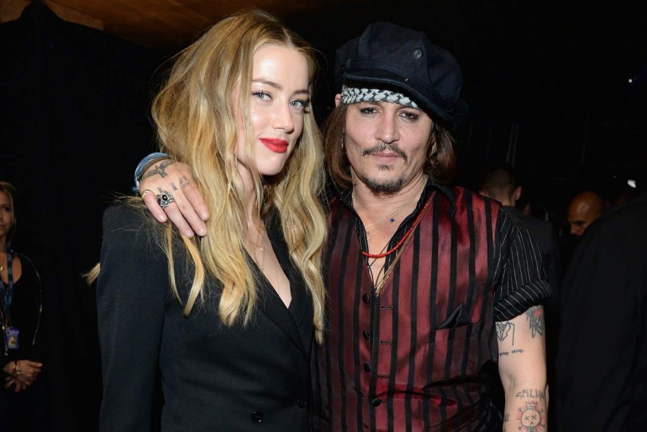 Johnny Depp's with ex-wife Amber Heard in happier days. 
