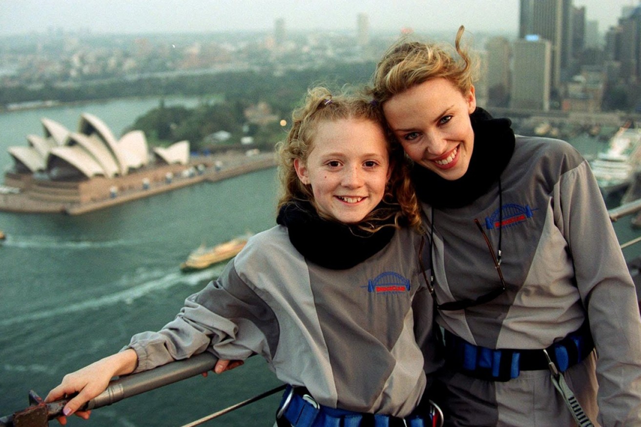 Webster (left) with Kylie Minogue in 2000.