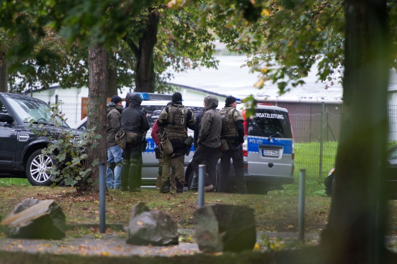 Members of a special police unit in Chemnitz, the centre of a manhunt for a 22 year old Syrian.