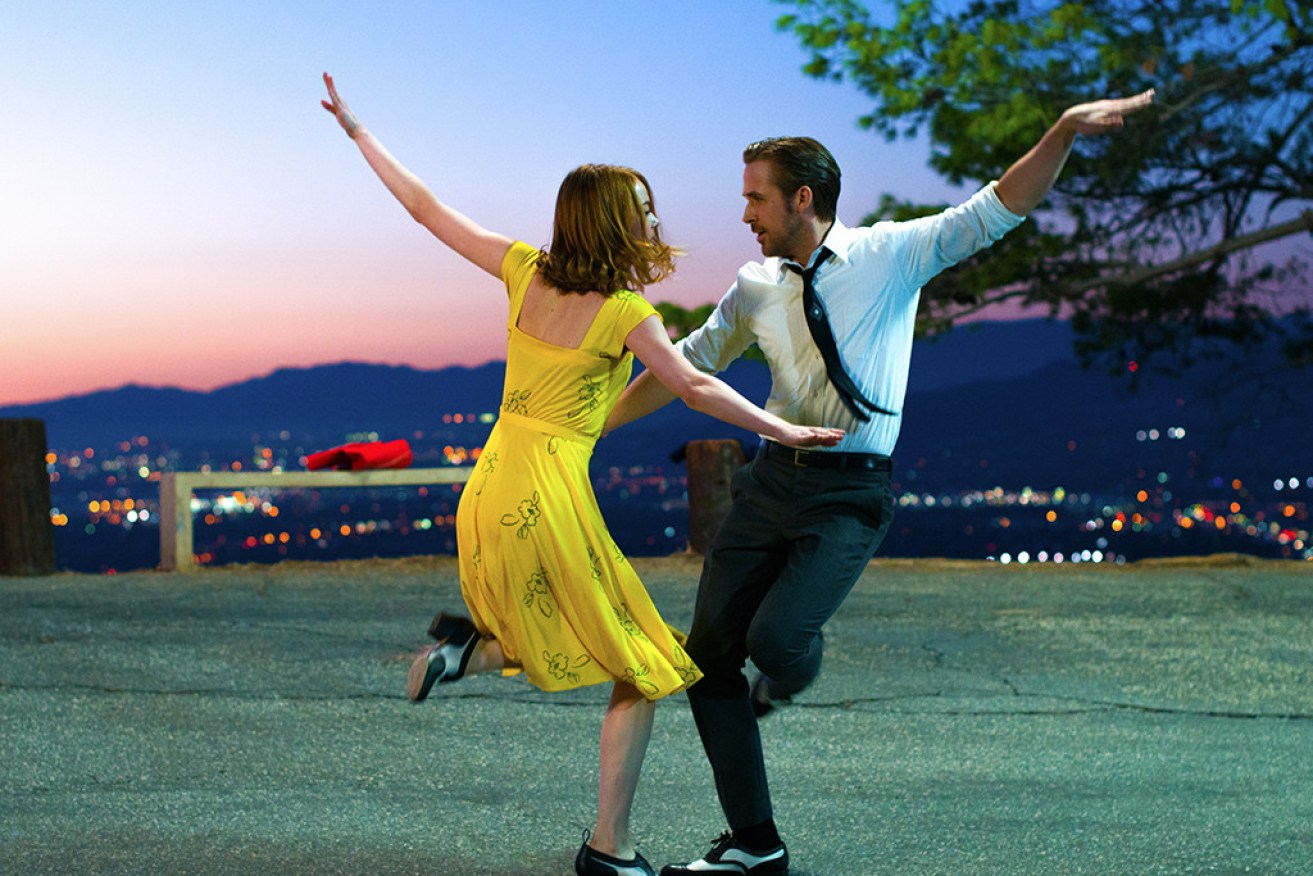 Emma Stone and Ryan Gosling shine in the joyous <i>La La Land</i>.