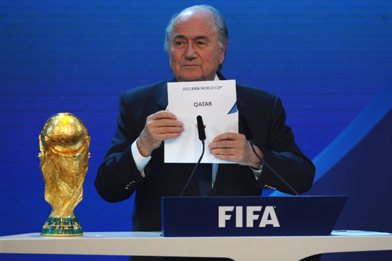 Ex-FIFA president Sepp Blatter announces Qatar as hosts of the 2022 World Cup.