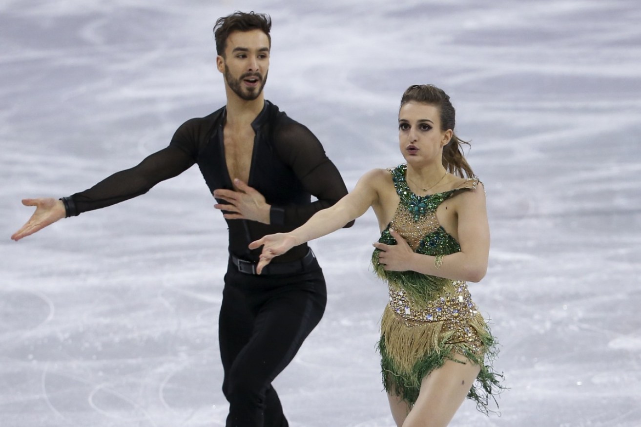 Despite a costume issue, Gabriella Papadakis and Guillaume Cizeron finished the day in second place.