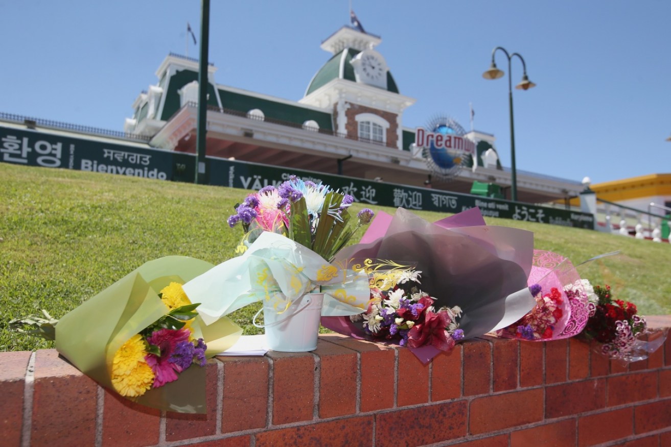 One year on, flowers can be seen at the entrance to Dreamworld on October 25, 2017. Four people were killed following an accident on the Thunder River Rapids ride at the Gold Coast theme park.