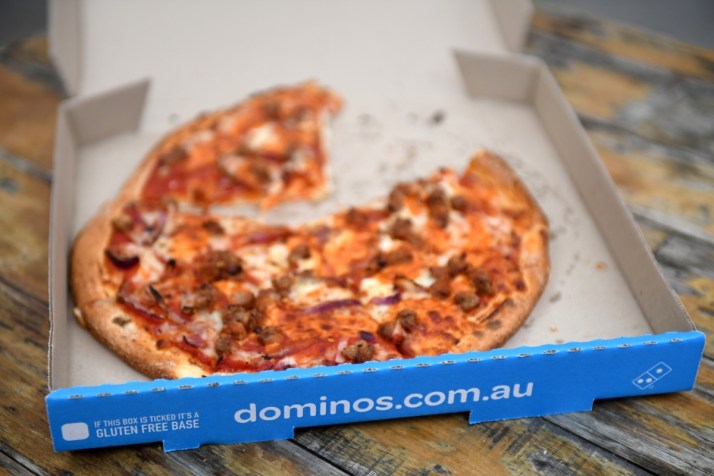 Domino’s Pizza goes cold as first-half profit sliced