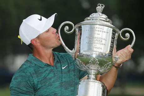 Koepka wins US PGA Championship, Tiger Woods runner up