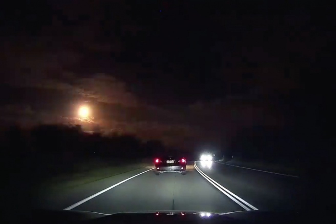 Dashcam footage shows a meteor passing through Perth's sky.
