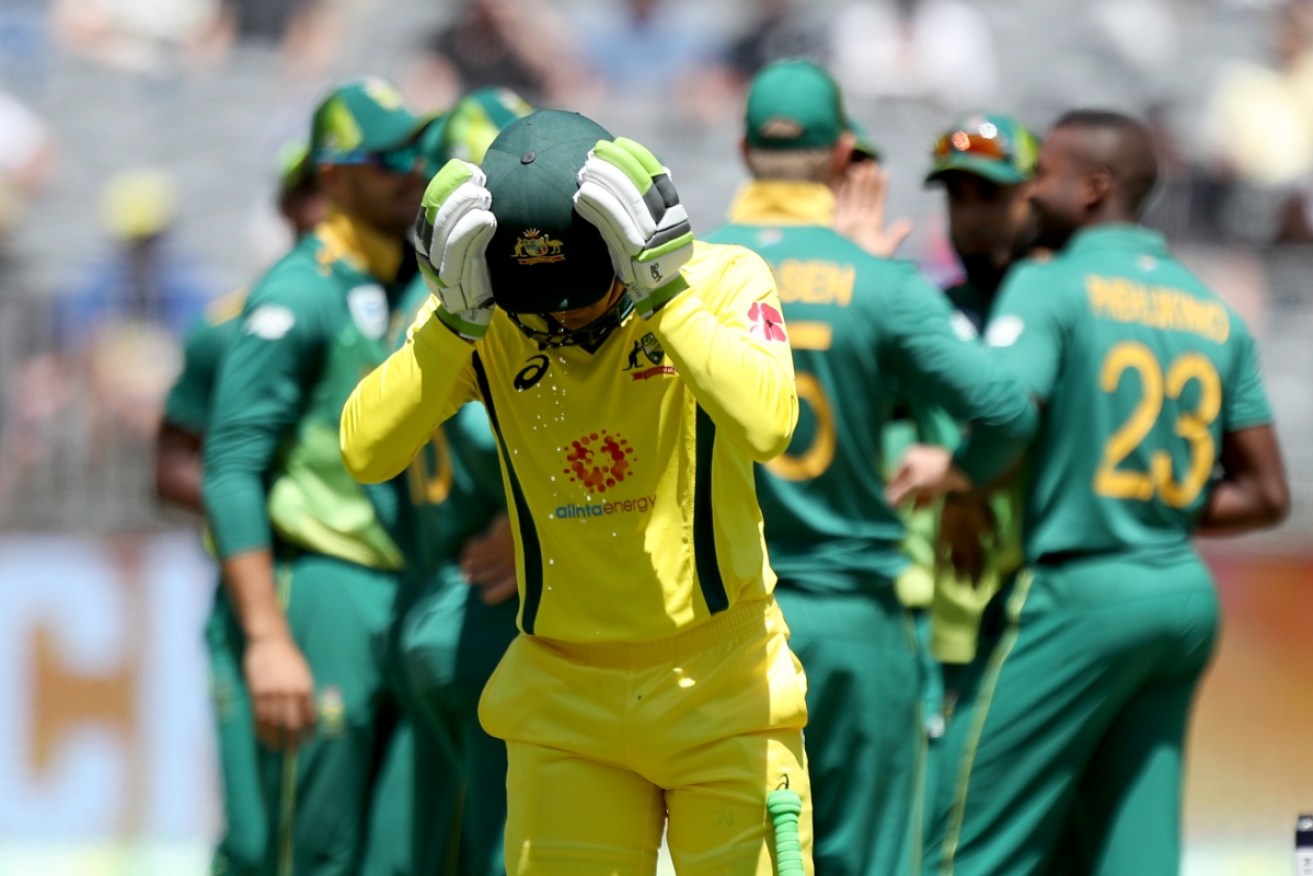 Australian batsman Alex Carey hangs his head in dismay after one of his infamous and costly reverse sweeps.