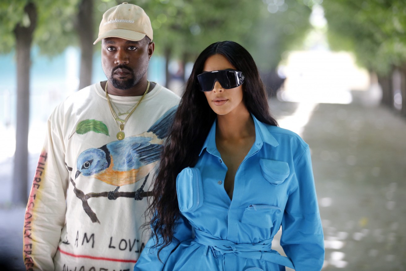 What fashion era are we in?  Kim Kardashian and Kanye West sport all the looks. 