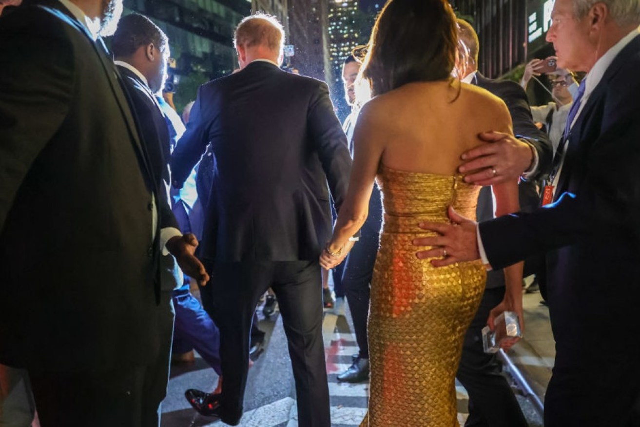 Prince Harry and Meghan leaving the Ziegfeld Ballroom in Manhattan before the car chase.