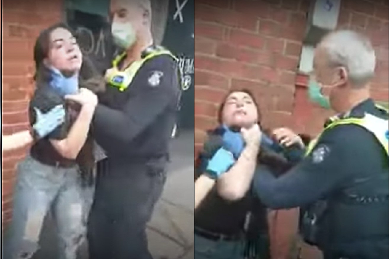 A 21-year-old woman has been charged after this violent confrontation with police in Melbourne on Monday.