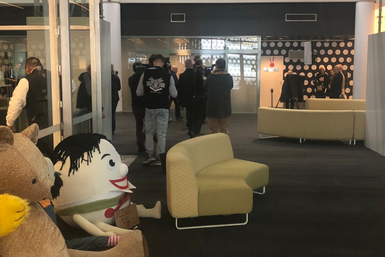 Federal Police officers enter the ABC's Sydney headquarters as part of an investigation into a media leak. <i>Photo: ABC</i>