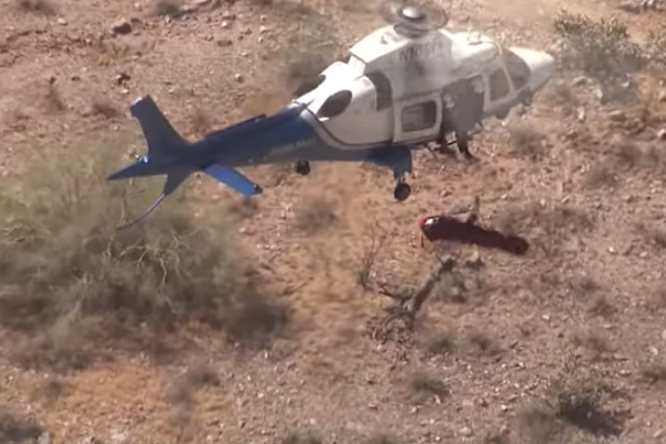 A 74-year-old woman was eventually winched to safety after her stretcher spun wildly out of control in Arizona.