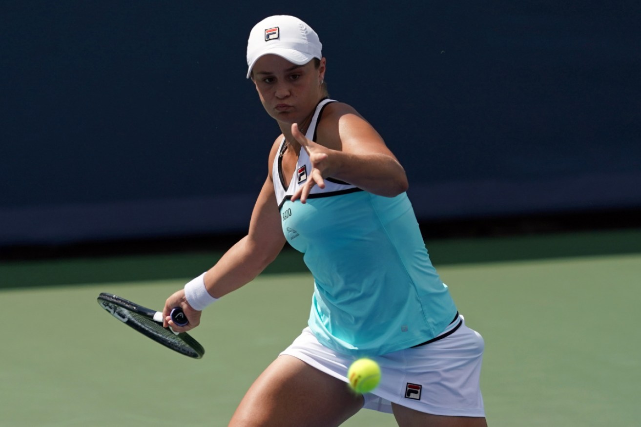 Top seed Ashleigh Barty fought back from a set down to reach the quarter-finals of the Cincinnati Open for the first time.