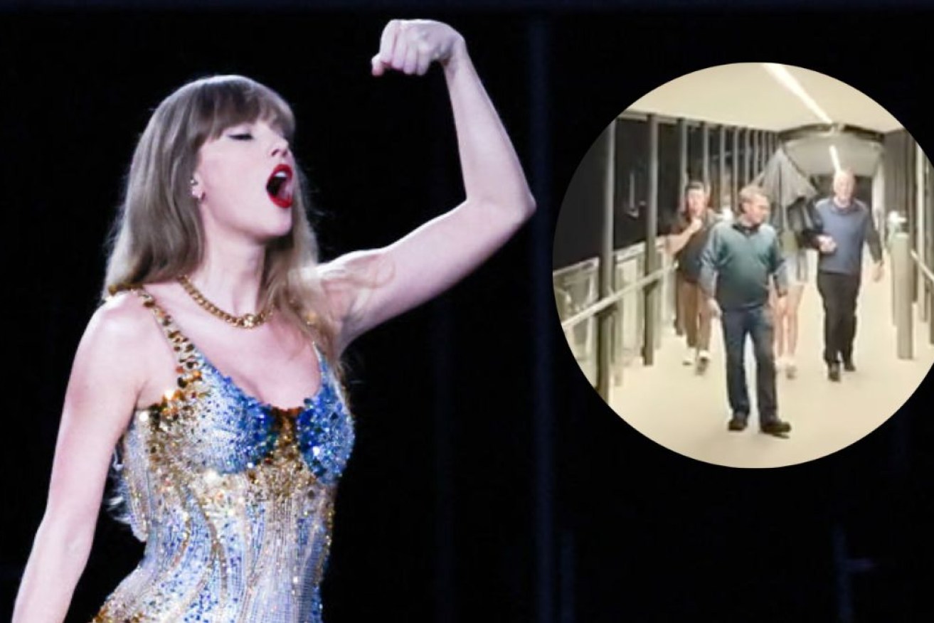 Taylor Swift's father has been accused by a paparazzo of assaulting him at a ferry wharf after the final night of his popstar daughter's Australian shows.