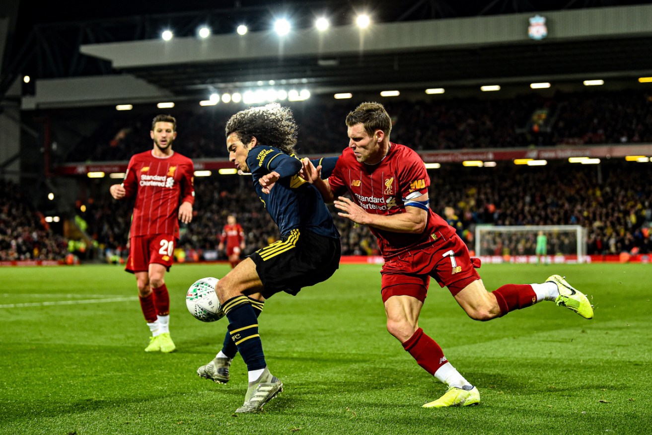 Arsenal's Matteo Guendouzi competes with Liverpool midfielder James Milner. They would also join the breakaway league.