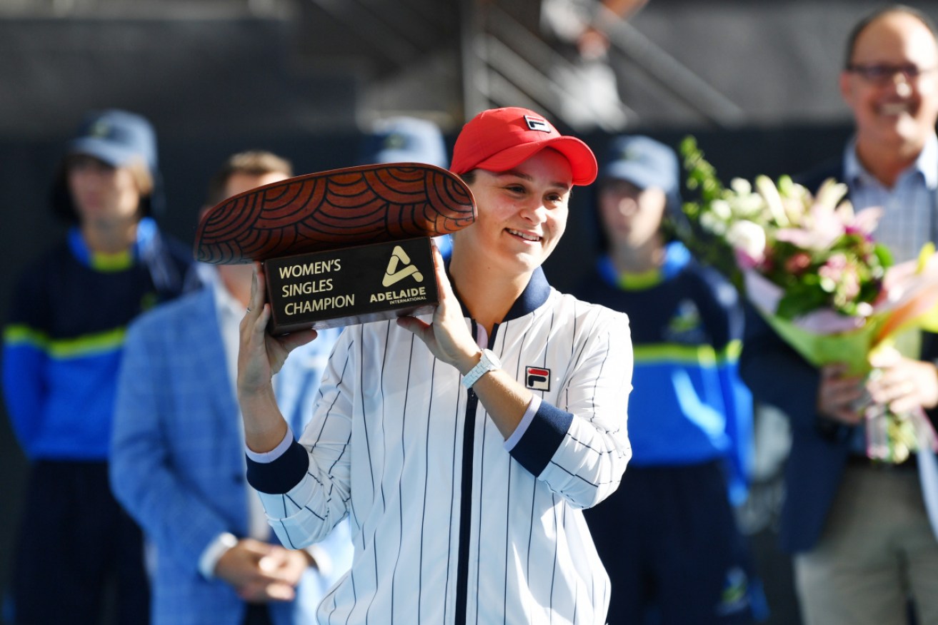 Ash Barty with the Adelaide International trophy. 