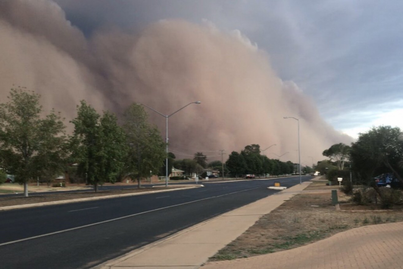 Damaging winds produced by thunderstorms across central NSW have whipped up dust storms.