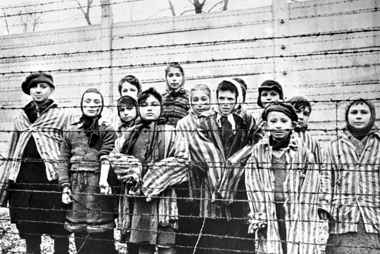 A group of child survivors at Auschwitz-Birkenau on the day of the camp’s liberation by the Red Army, on January 27, 1945.