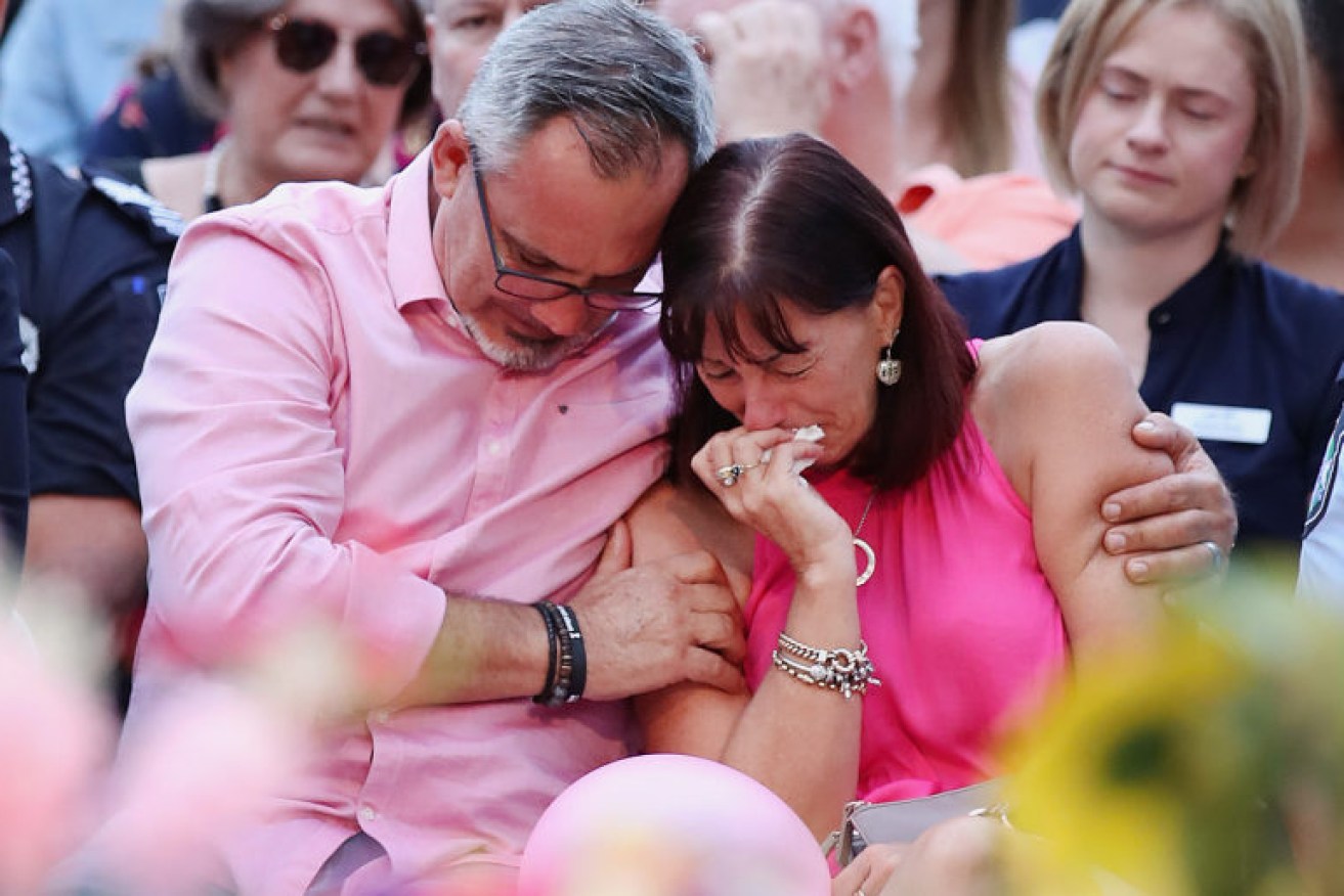 Lloyd and Suzanne Clarke, parents to Hannah Clarke, at the vigil in Brisbane on Sunday night.