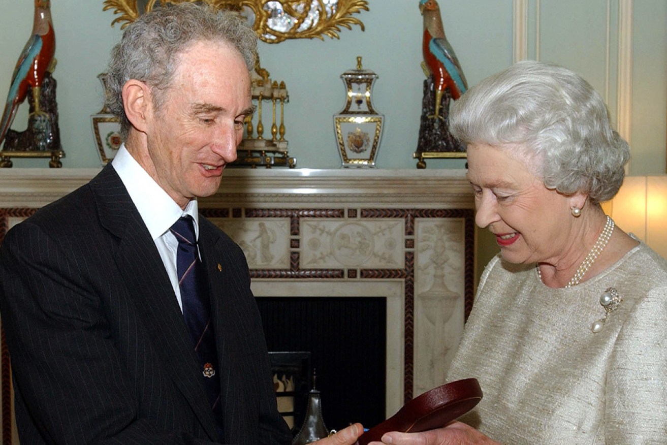 Physicist, applied mathematician, zoologist and Royal Society president, Lord May of Oxford is invested by the Queen in 2002.