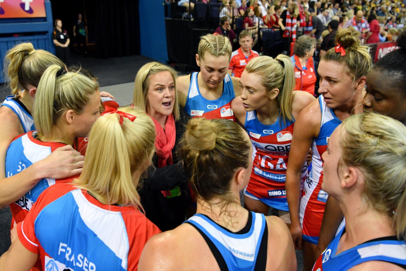 NSW Swifts coach Briony Akle (centre) will be keen to start the 2020 season in August. 