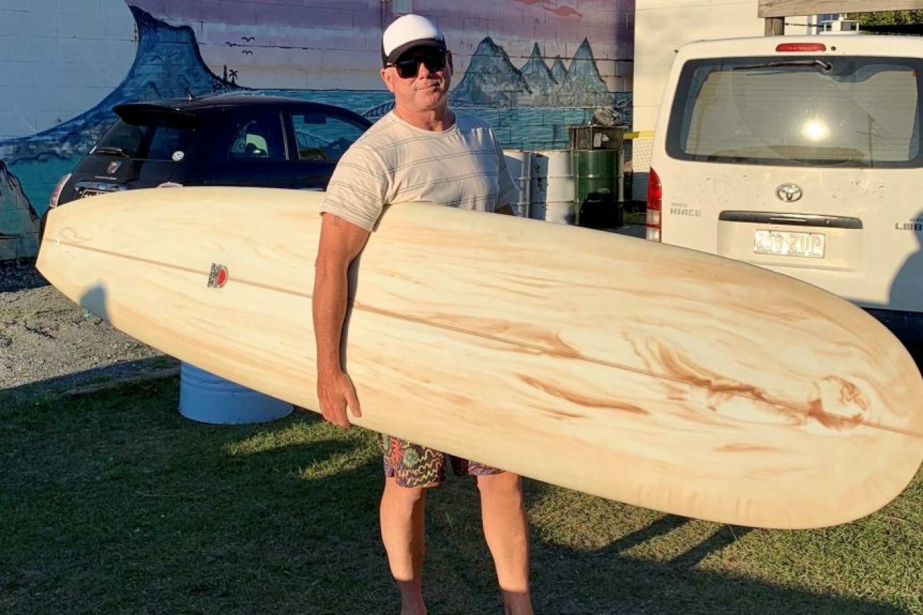 A week before being attacked by a shark, Nick Slater bought a new surfboard on the Gold Coast.