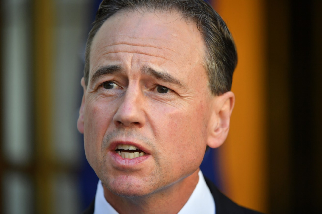 Greg Hunt has apologised after two nursing home residents received four times the correct amount of the coronavirus vaccine.