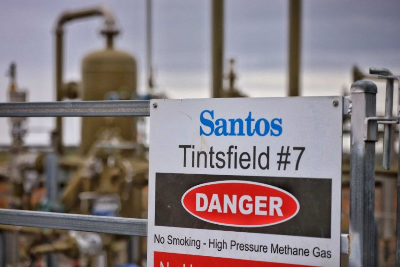 Santos chief Kevin Gallagher says demand for its products remains strong, despite a fall in profits.
