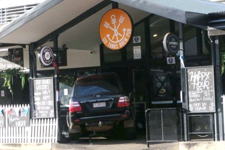 Man charged after car rammed into Darwin pub