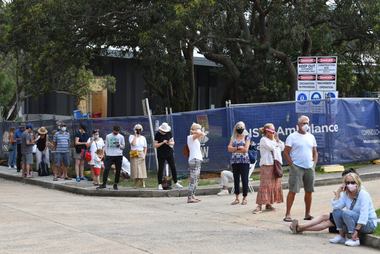 People line up for Covid-19 testing at Mona Vale Hospital's walk-in clinic in Sydney.