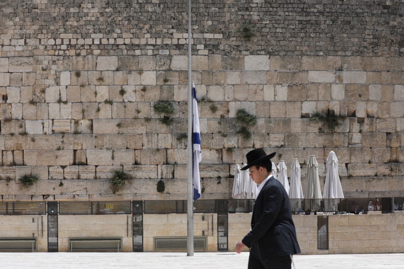 Israeli flags were lowered to half-mast in honor of the victims who died in the stampede.