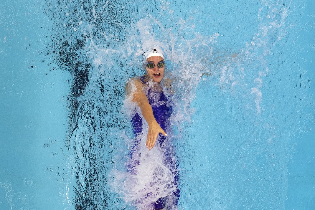 Kaylee McKeown has broken the world 100m backstroke world record at the Australian Olympic trials.