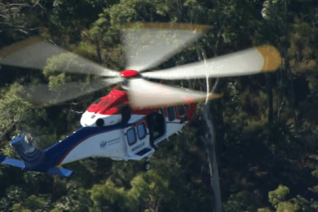 High-risk rescue underway after woman found clinging to cliff after car crash