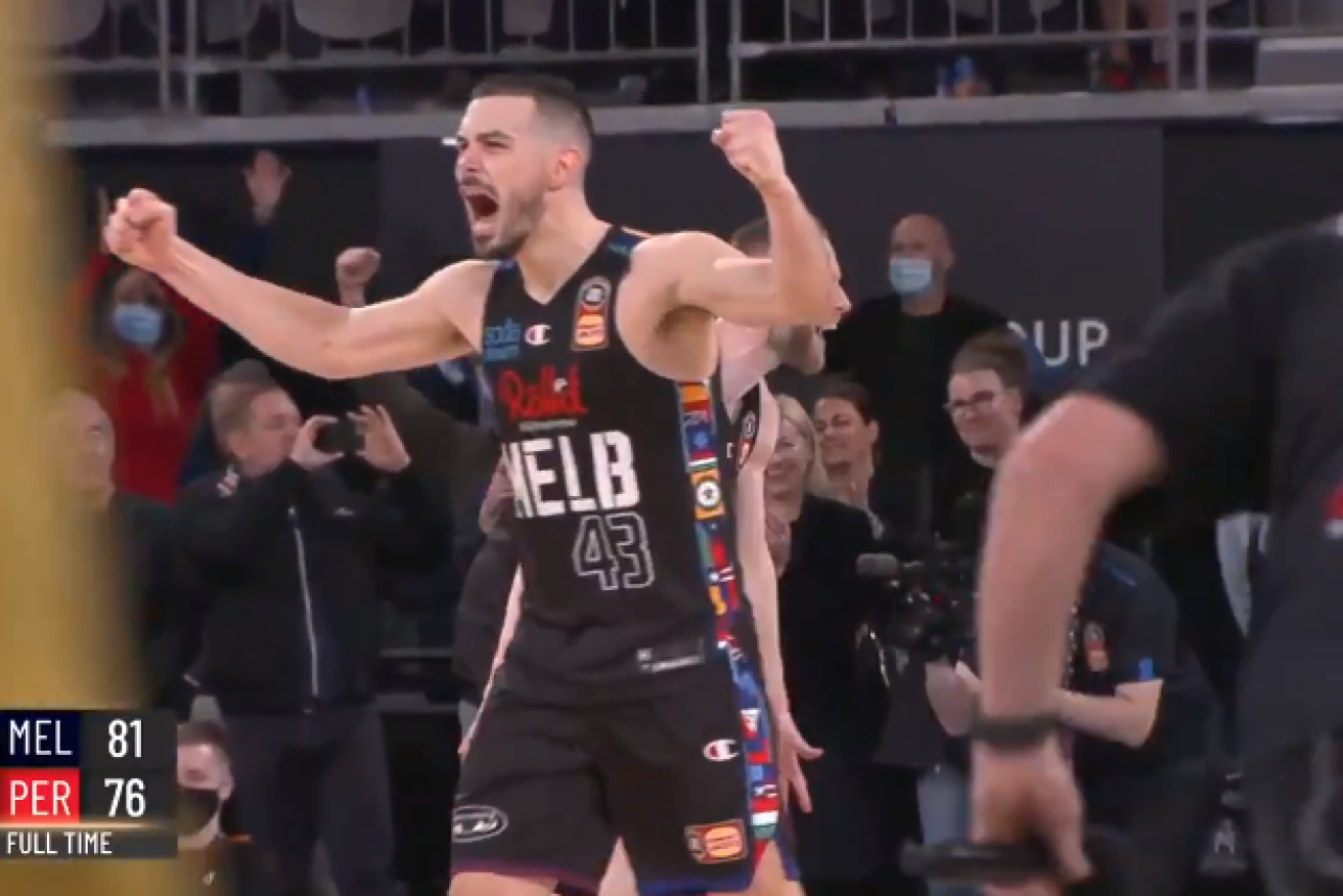 Melbourne United's Chris Goulding erupts in triumph as the scoreboard told the story.