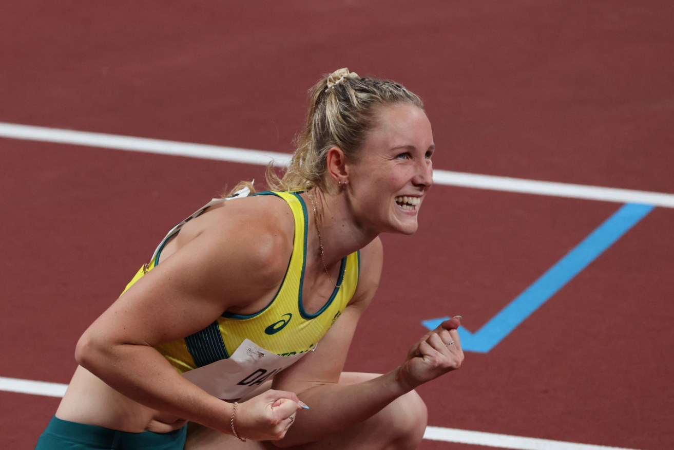 Riley Day reacts with joy after her 200m semi-final on Monday night.