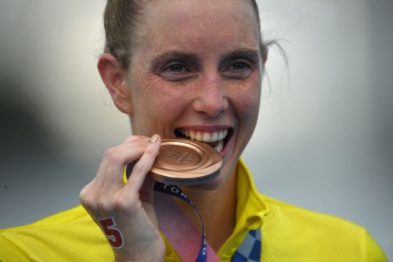 Kareena Lee on the podium with her medal – Australia's first in marathon swimming.