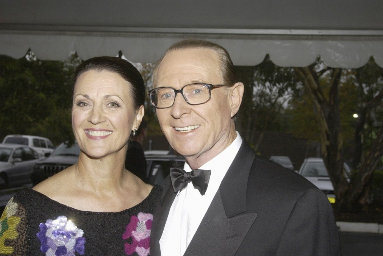 Brian Henderson with wife Mardi at a 2002 function to honour his 46 years in TV.