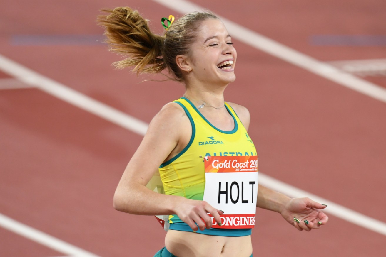 Isis Holt has won silver in the T35 100m, finishing a gallant second to China's Zhou Xia