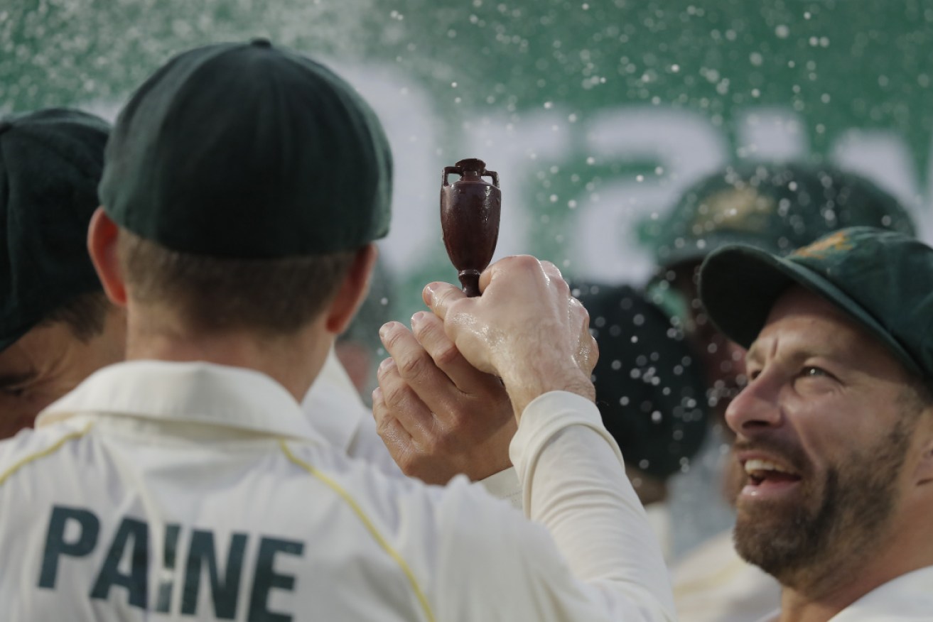 Tim Paine and teammates celebrate Ashes victory in 2019.