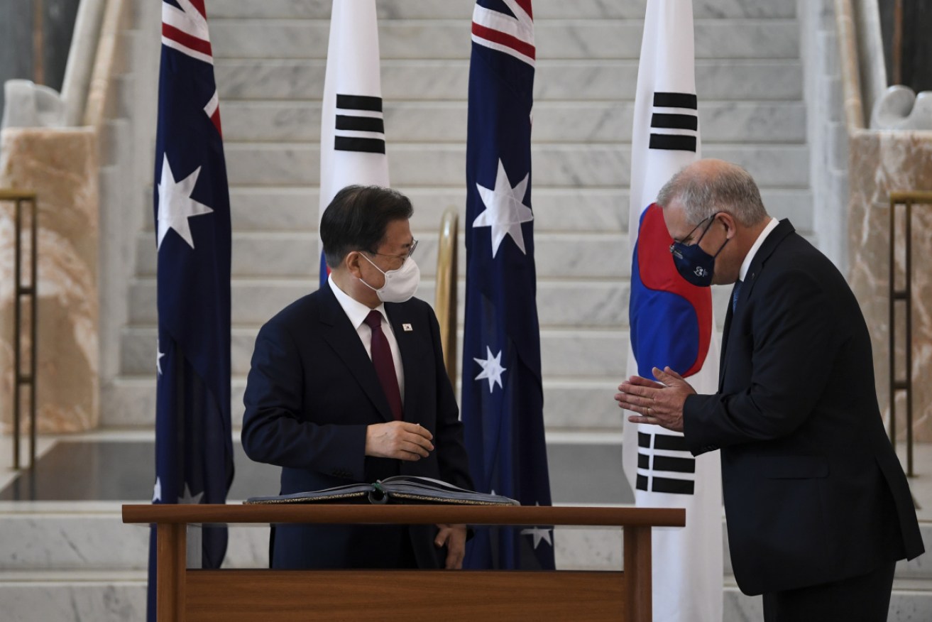 Scott Morrison's meetings with the South Korean leader have gone ahead despite a COVID-19 scare.