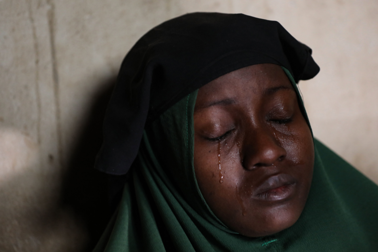 Tears bathe Humaira Mustapha's face after Nigerian bandits emerged from their jungle hideouts to snatch her two daughters in 2021.