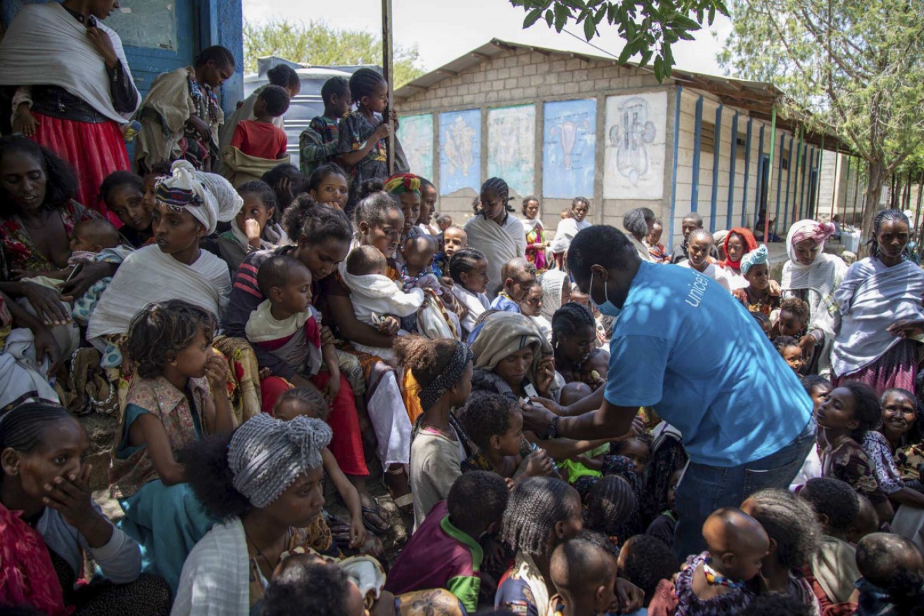 UNICEF nutrition specialist Joseph Senesie screens children for malnutrition in Tigray, Ethiopia.