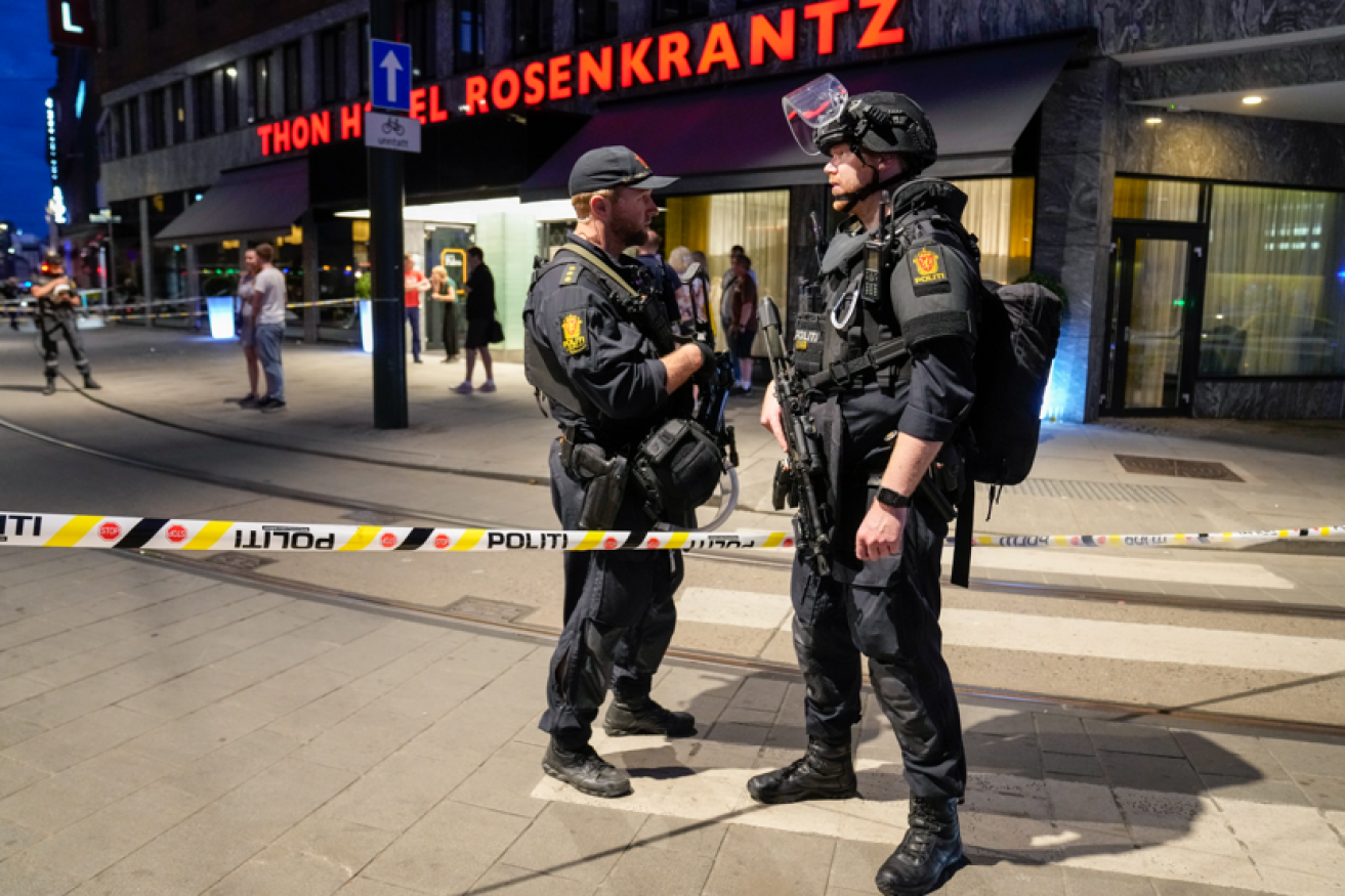 Norwegian SWAT squad officers outside the gay bar where two people were slain. <i>Photo: EPA</i>