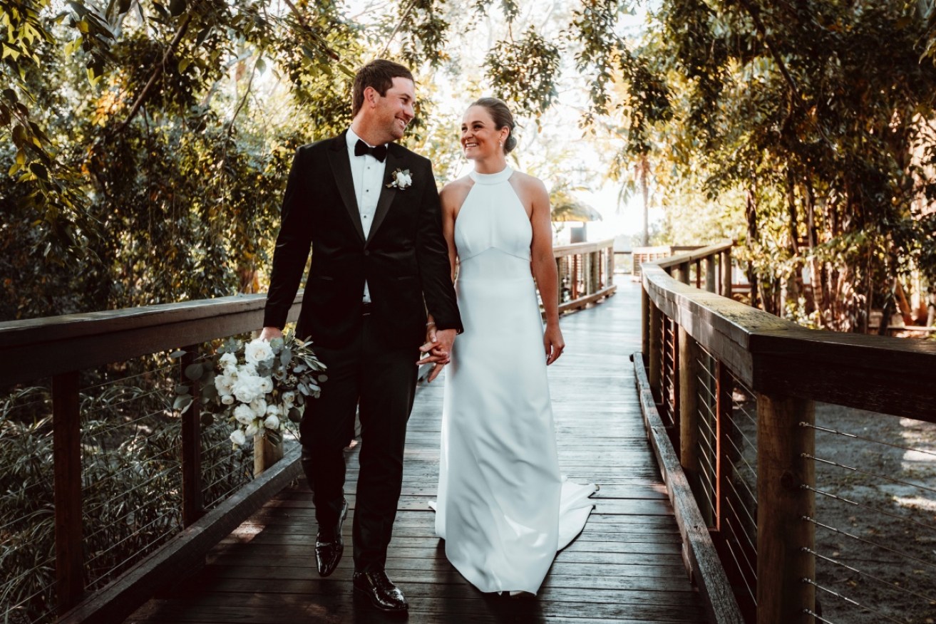 A radiant Ash Barty  tied the knot with Garry Kissick in July 2022. Now they're about to become a trio. <i>Photo: Supplied</i>