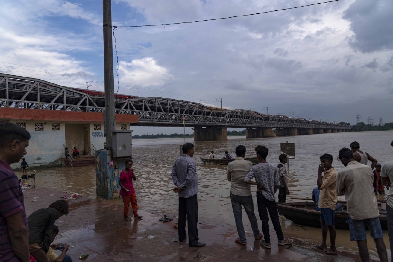 Heavy rain in India has swollen rivers and triggered landslides in the past three days.