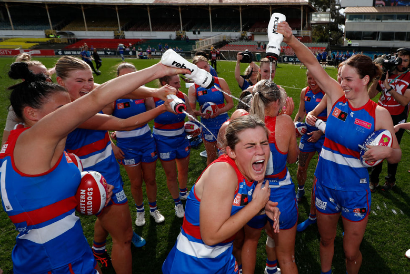 The Bulldogs' Celine Moody gets an AFLW christening after the win over GWS. <i>Photo: Getty</i>