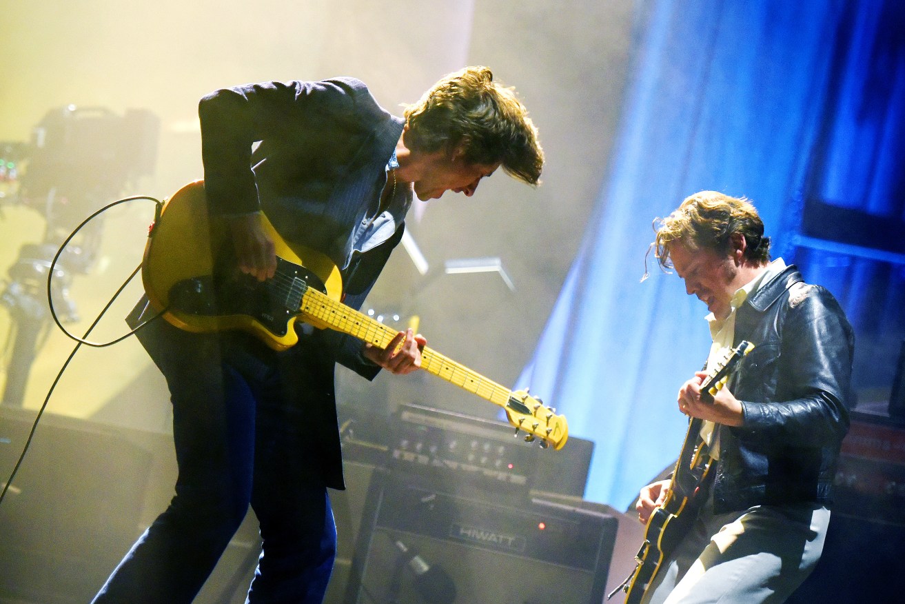 Arctic Monkeys will headline the Falls Festival in Melbourne in December.