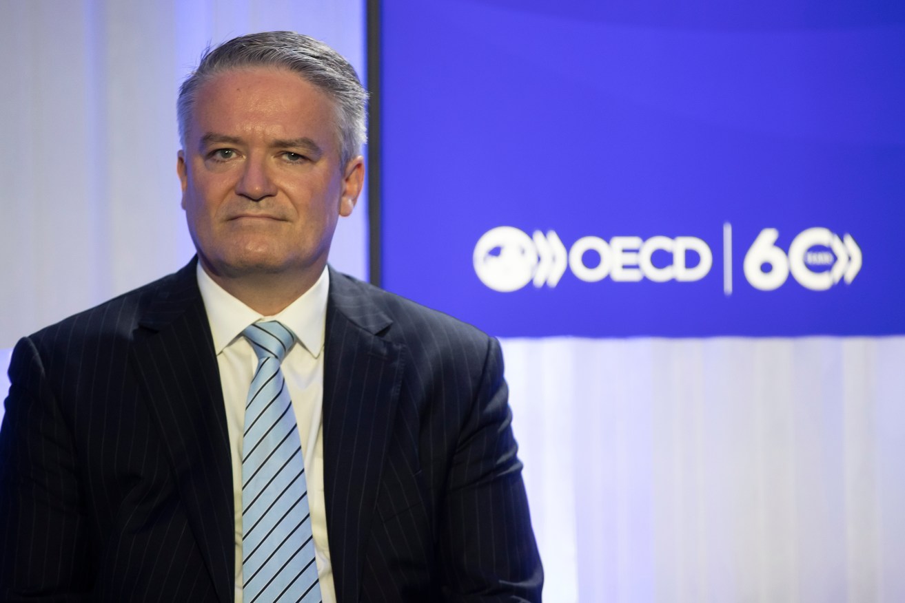 OECD boss Mathias Cormann says the global economy lost momentum after Russia's war in Ukraine.